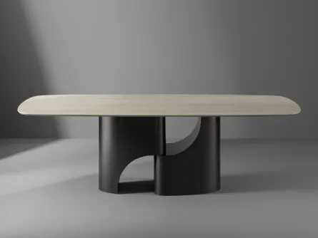 Tavolo Taijitu con piano in marmo e base in metallo di Bonaldo