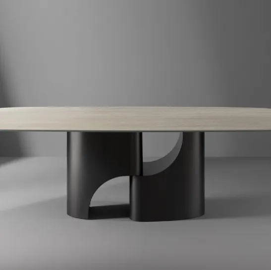 Tavolo Taijitu con piano in marmo e base in metallo di Bonaldo
