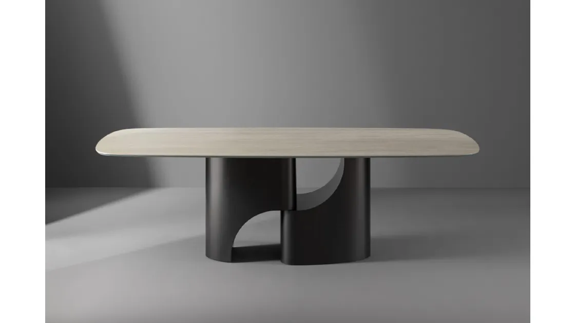 Tavolo Taijitu con piano in marmo e base in metallo di Bonaldo